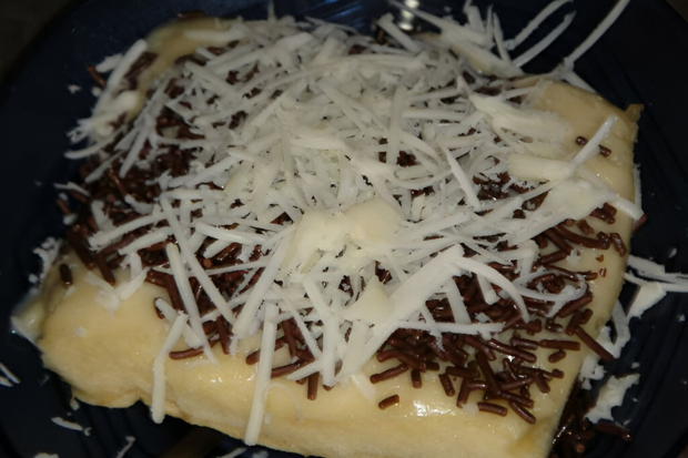 eran Kue Pancong bagi Ekonomi Masyarakat Kecil